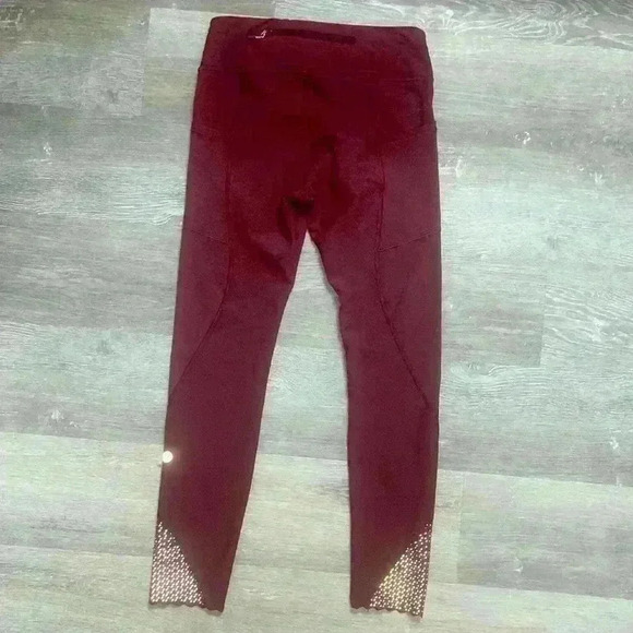 Lululemon Tight Stuff Tight II 25" size 4 like new condition 
Deep Ruby - Picture 10 of 16